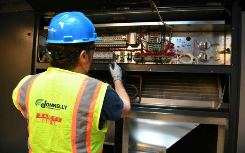 Employee working on hvac system